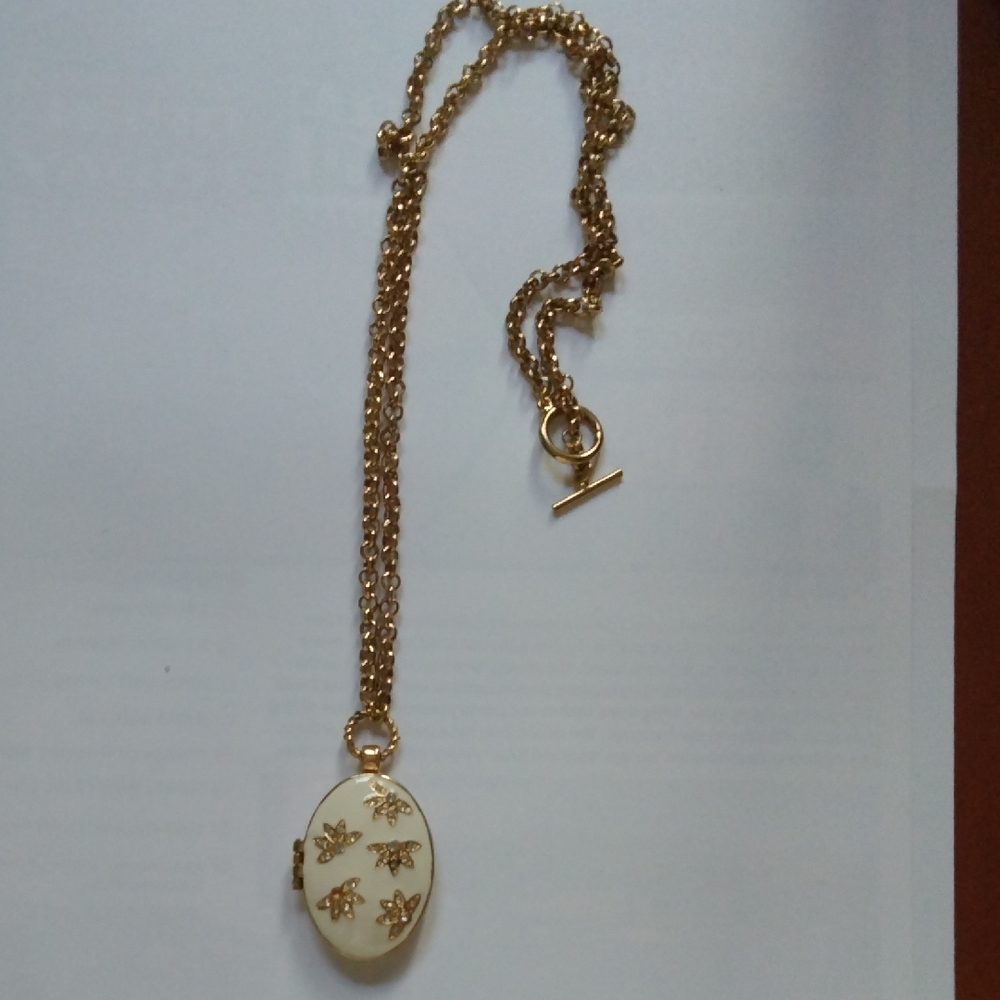 Elegant Gold and Cream Locket Necklace